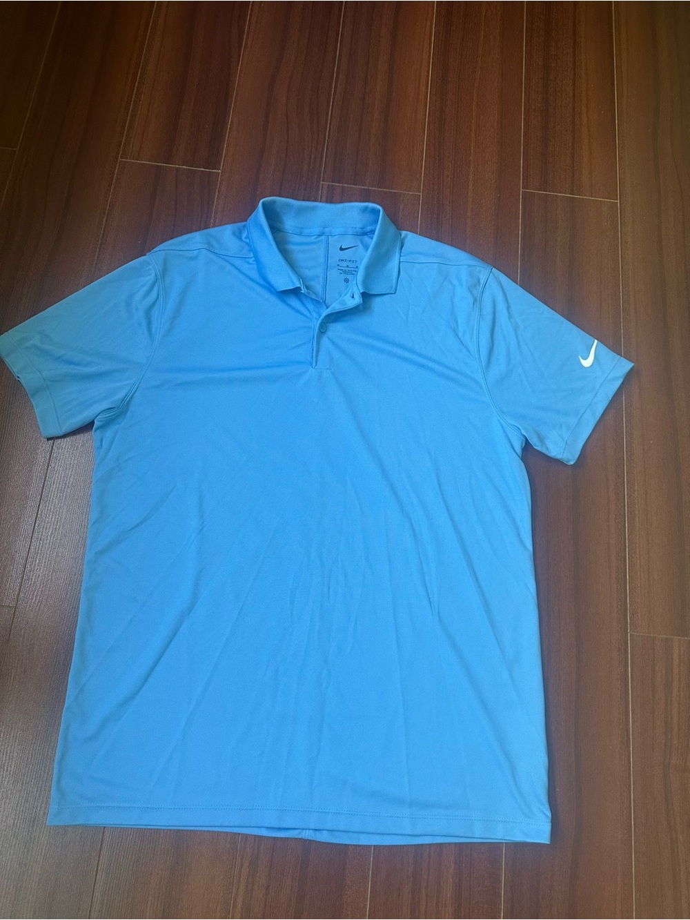 Nike Men’s Sky Blue Polo Shirt with Sleeve Swoosh